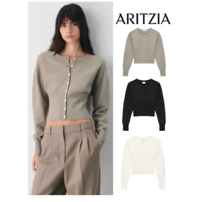 Three cropped button-front sweaters, since this tile runs a keyword search rather than a category